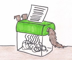 Suspicious shredder with ears and a tail handle.