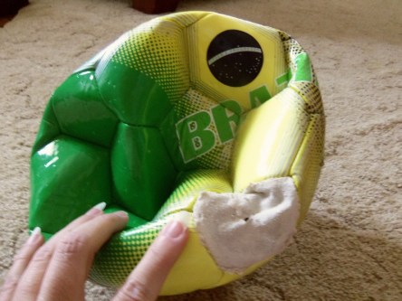 Toby's uninflated soccer ball.