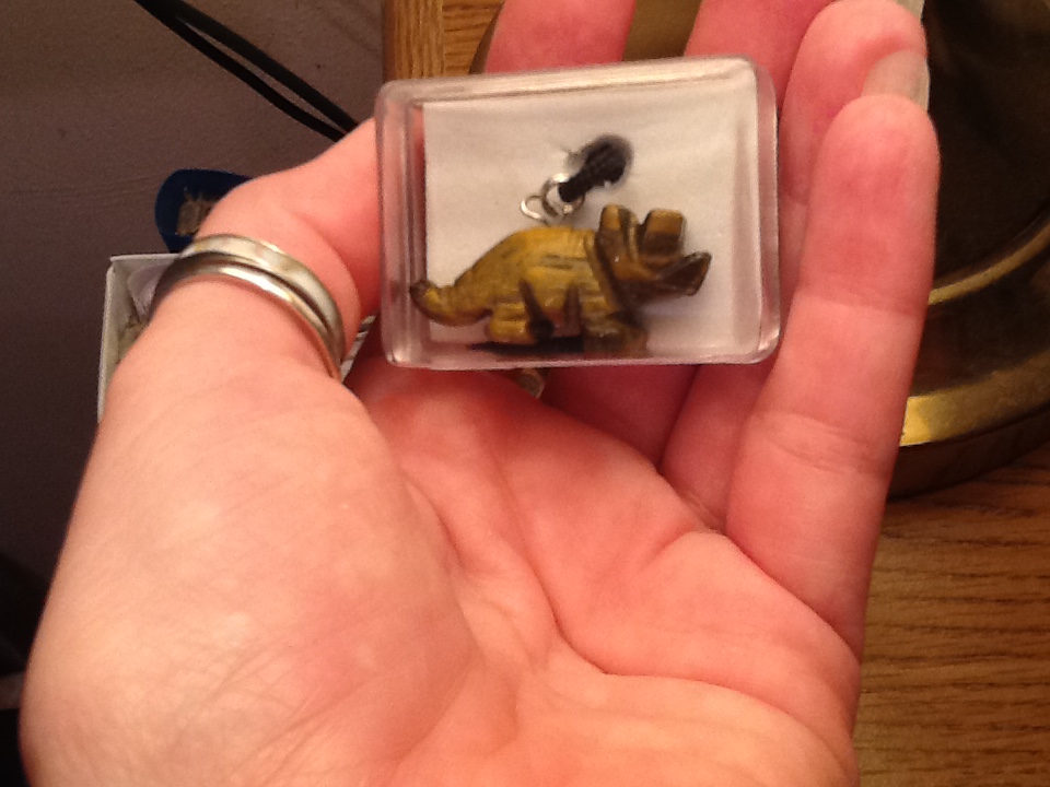 Triceratops pendats from a visit to the museum.