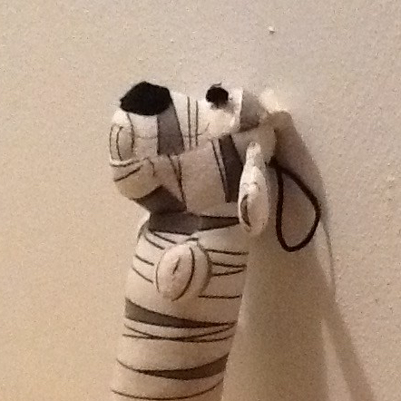 Sude view of Loofah dog posing for mug shot