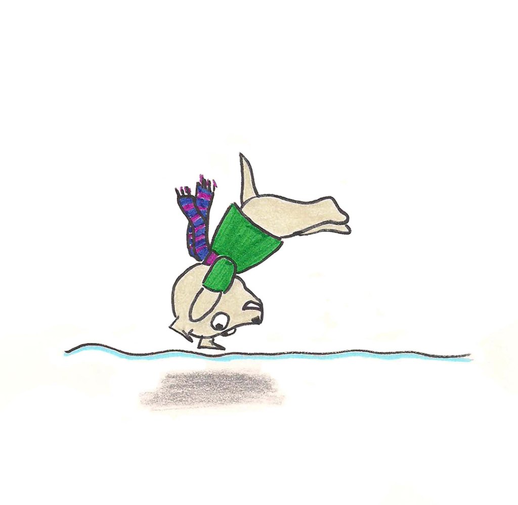 Puppy dives into fresh snow.