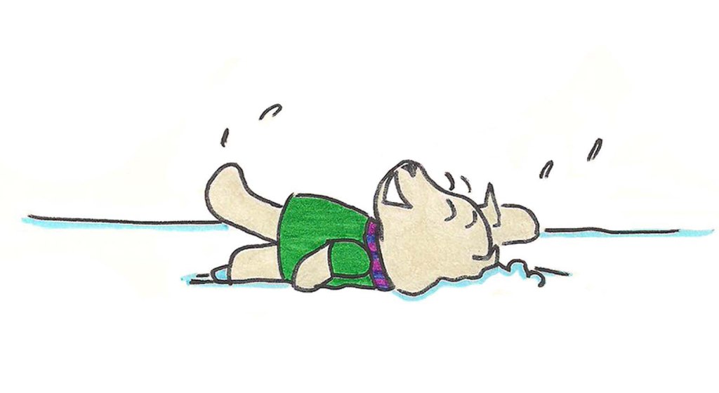 Puppy does the backstroke in fresh snow.